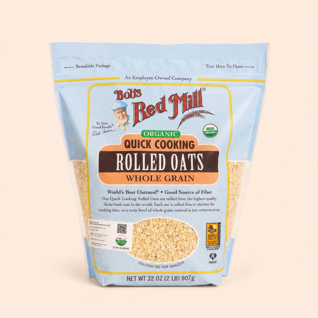 Cover produk Bob's Red Mill Organic Quick Cooking Rolled Oats 907g dengan latar krem