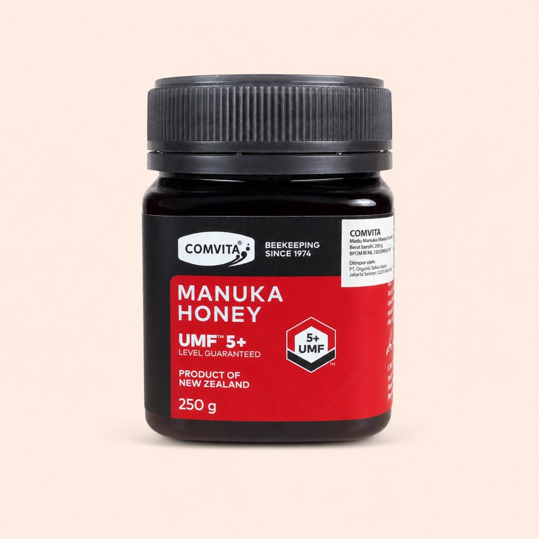 Cover produk Comvita Manuka Honey UMF 5+ 250g - Madu Murni New Zealand dengan latar krem