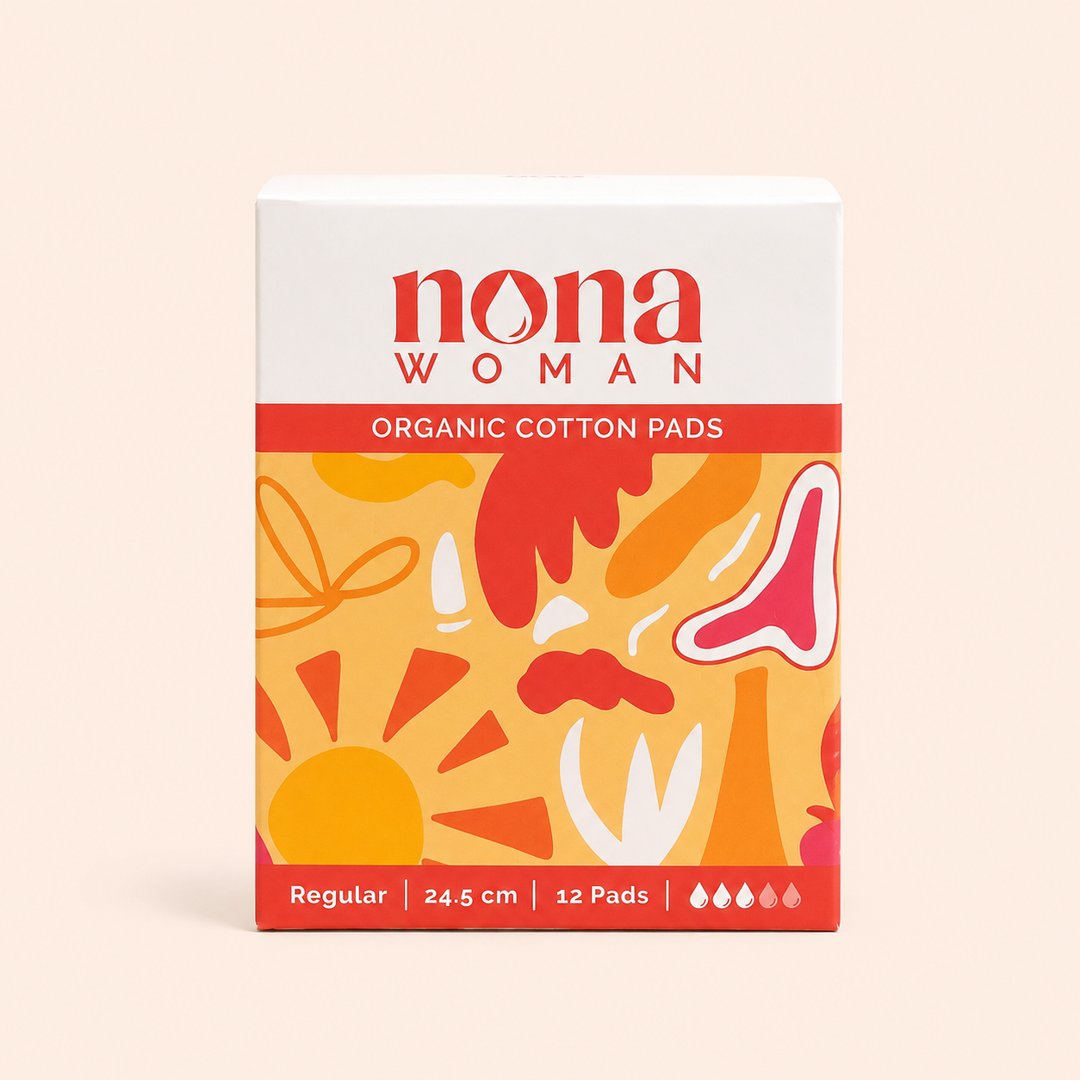 Cover produk Nona Woman Organic Cotton Pads Regular 24.5cm - 12 Pads dengan latar krem