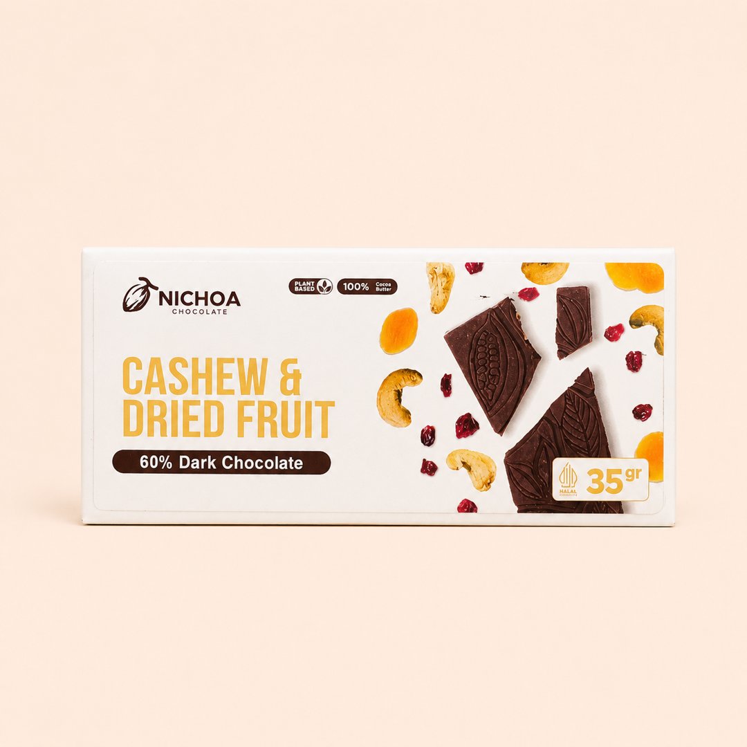 Cover produk Nichoa Cashew & Dried Fruit 60% Dark Chocolate 35g dengan latar krem