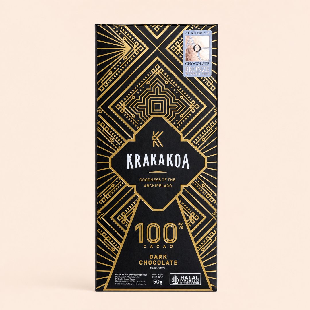 Krakakoa 100% Cacao Dark Chocolate 50 gram dengan latar krem.