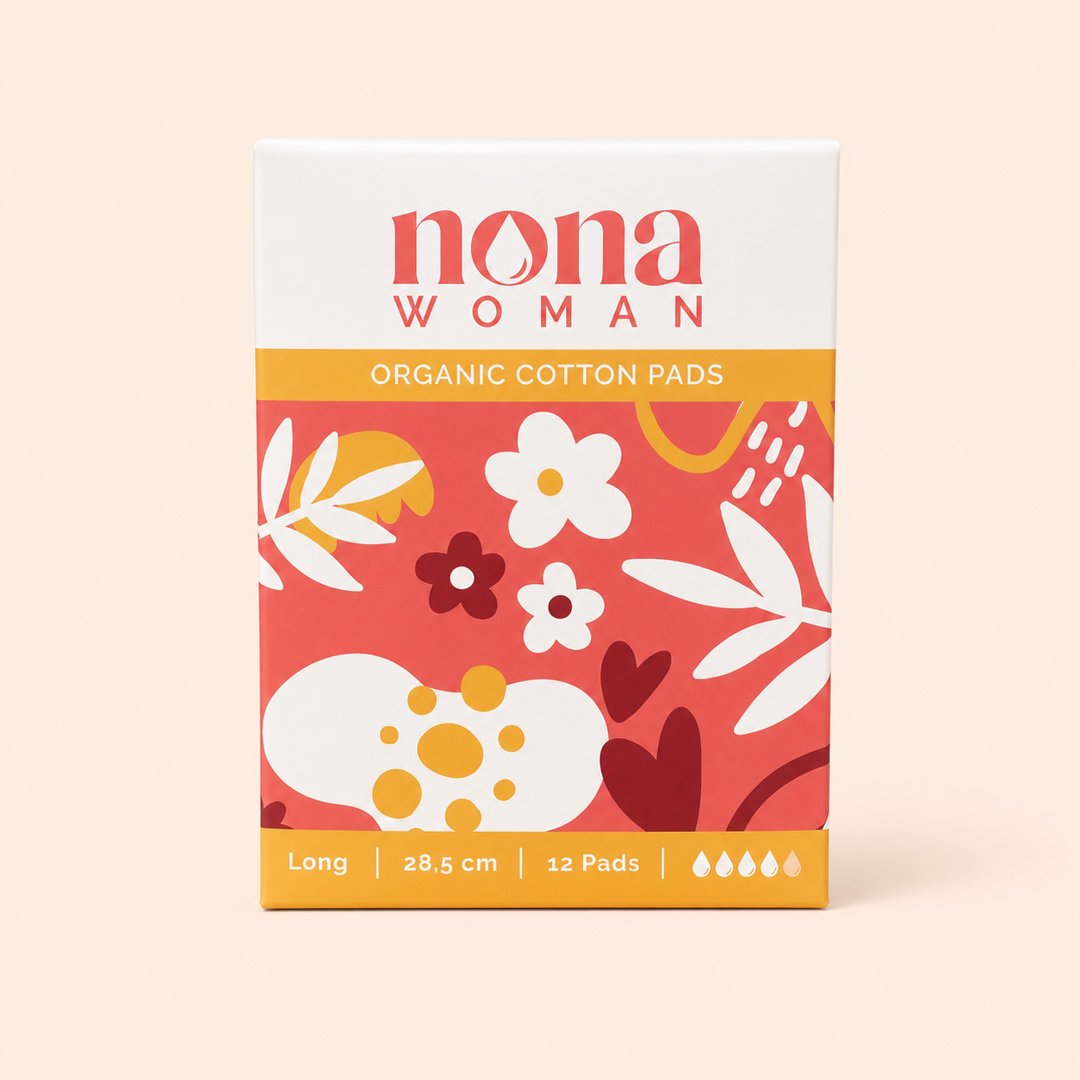 Cover produk Nona Woman Organic Cotton Pads Long 28.5cm (12 Pads) dengan latar krem