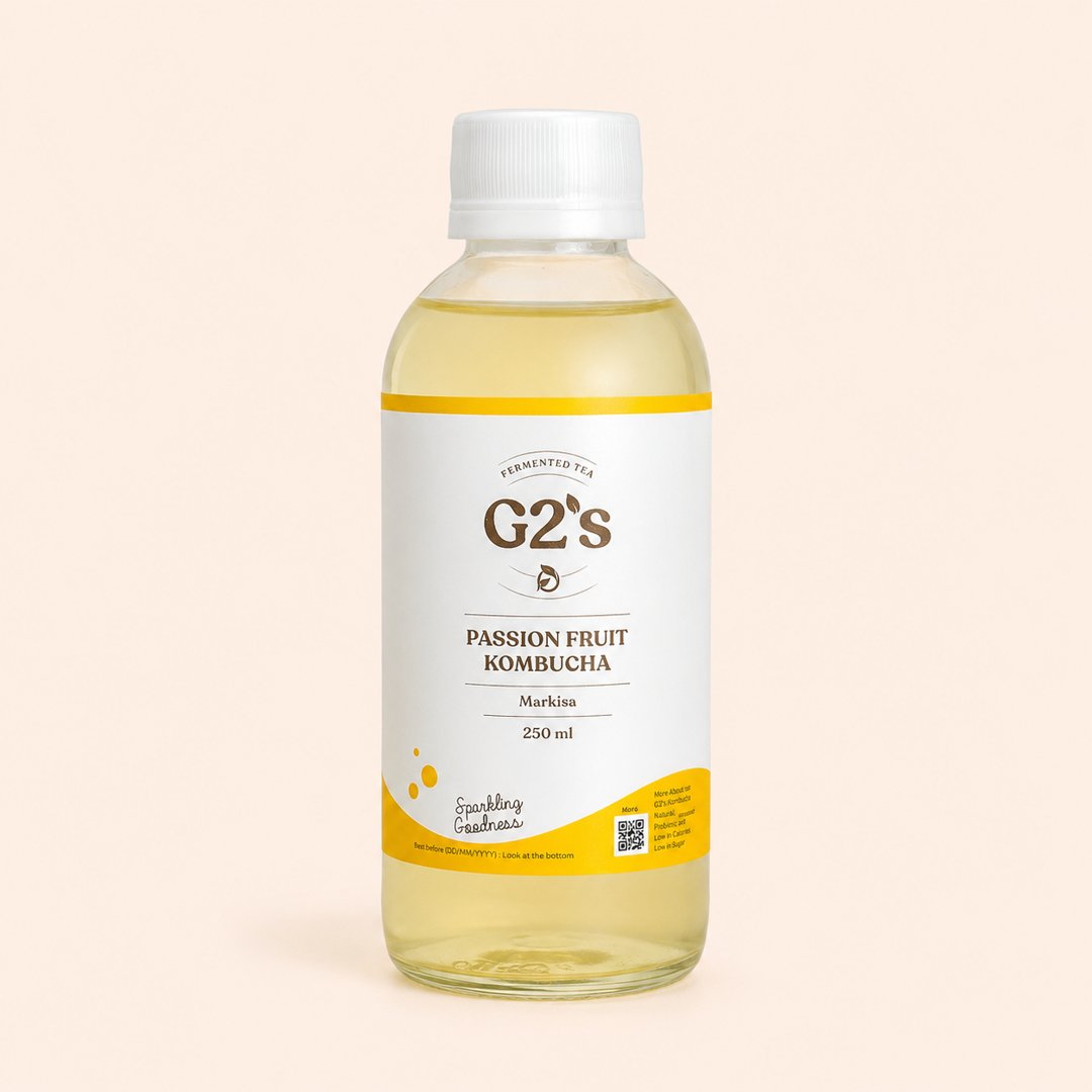 Cover produk G2's Passion Fruit Kombucha - Minuman Probiotik Markisa 250ml dengan latar krem