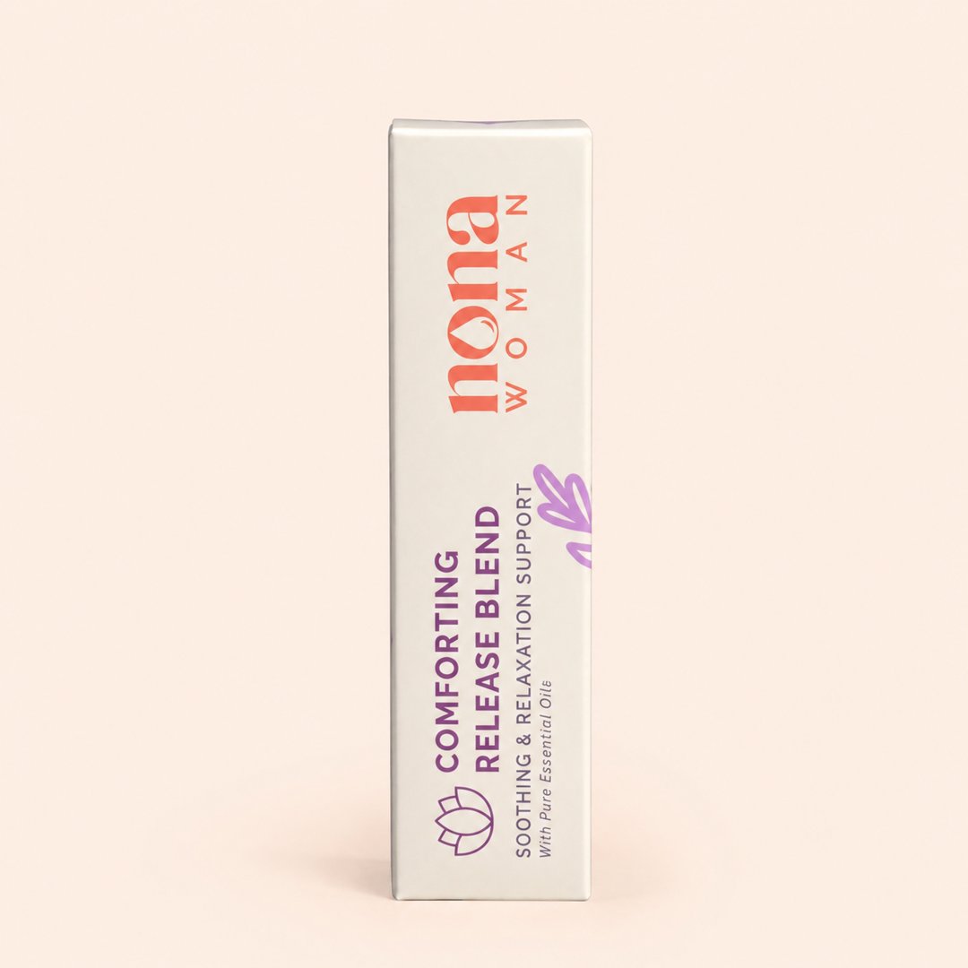 Cover produk Nona Woman Comforting Release Blend - Minyak Pijat Pereda Kram Menstruasi dengan latar krem