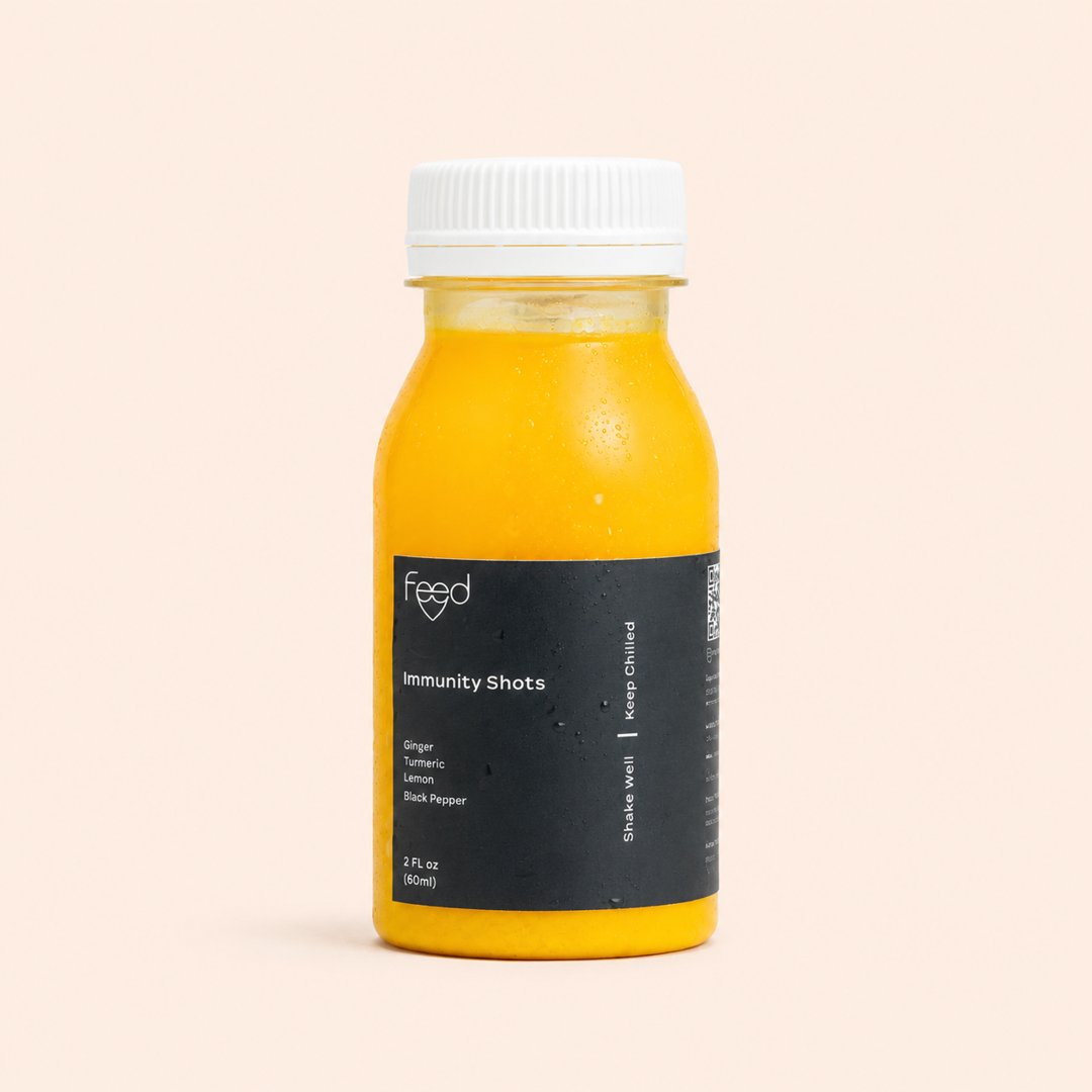 Cover produk Feed Immunity Shots - Minuman Herbal Jahe & Kunyit dengan latar krem