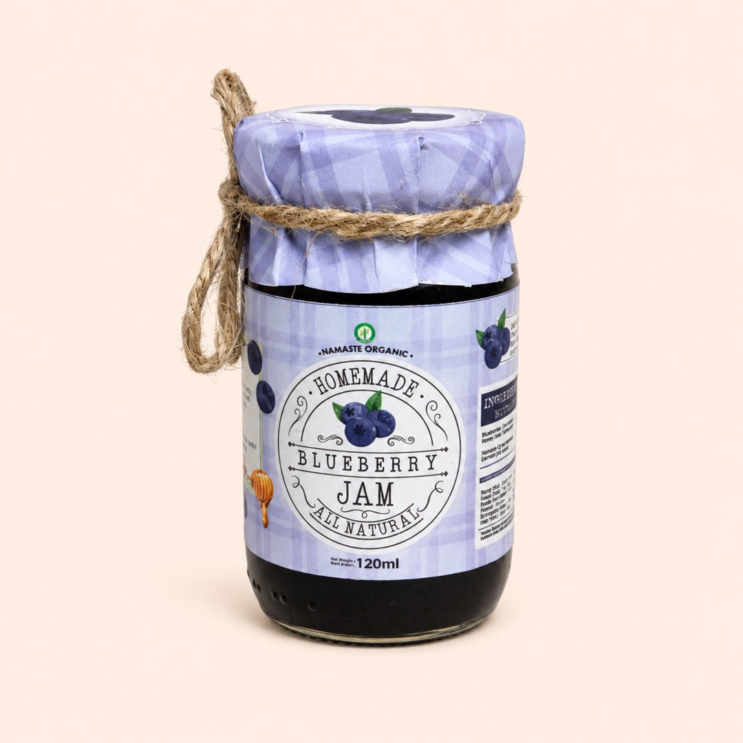 Cover produk Namaste Organic Homemade Blueberry Jam 120ml dengan latar krem