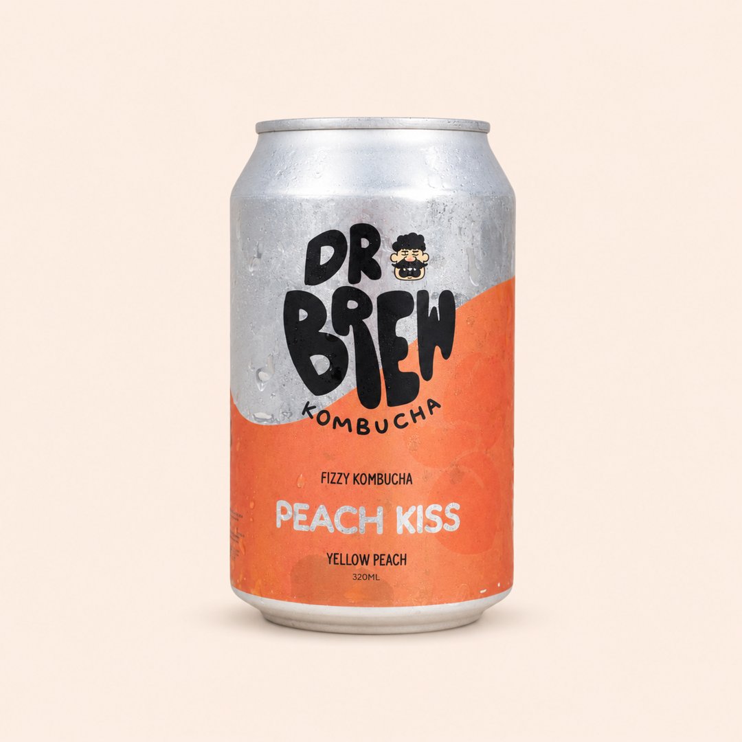 Cover produk Dr Brew Fizzy Kombucha Peach Kiss 320ml dengan latar krem